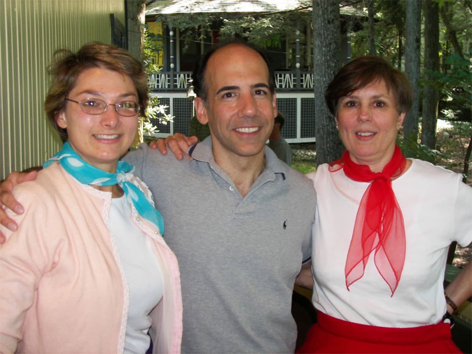 Chaz Esposito outdoors with two fans after a show